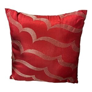 ACCENT pillow red poly/satin with silver metallic thread in waves on front.